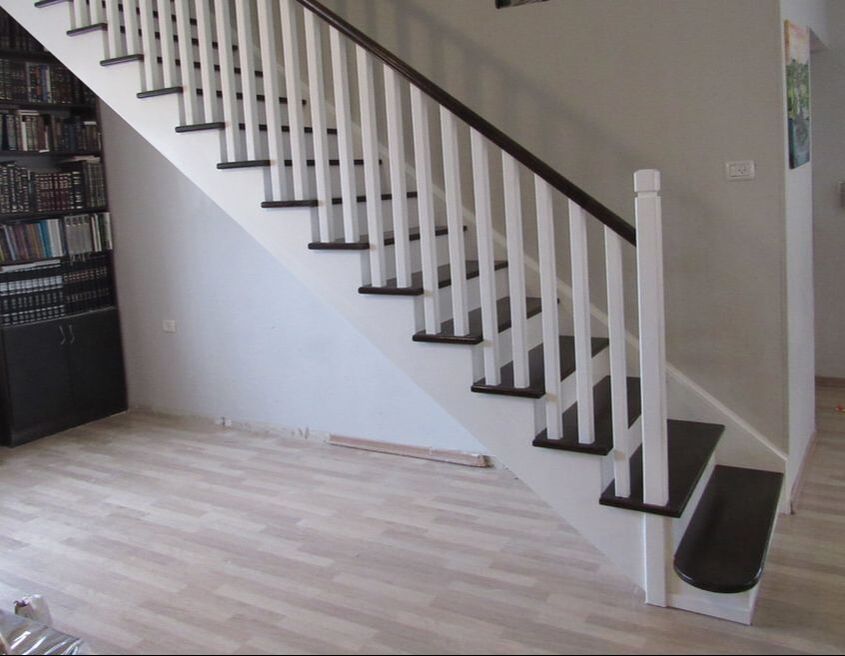 Custom designed and built stairs in stunning brown and white
