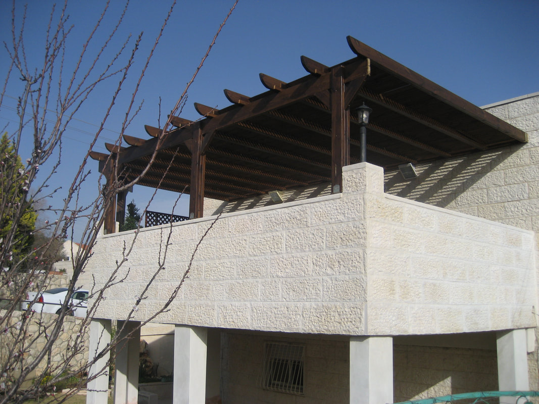Pergola with shade slats in Efrat
